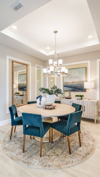 Furnished interior view inside a new home in Esplanade at Kingston, Estero (Image 14).