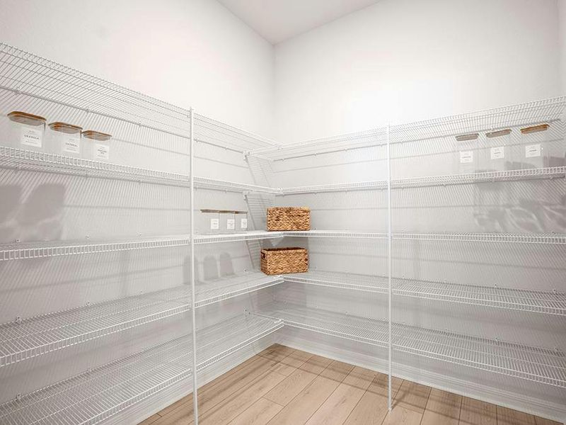 A walk-in pantry provides storage convenience - Shelby II by Highland Homes