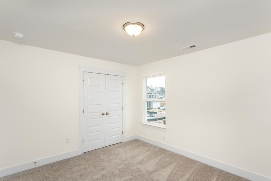 Spacious, unfurnished interior of a new home in Ford Meadows, Garner (Image 30).