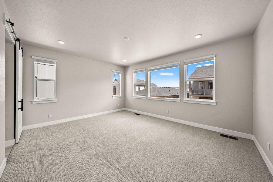 Spacious, unfurnished interior of a new home in Trumark Homes at Sterling Ranch, Littleton (Image 26).