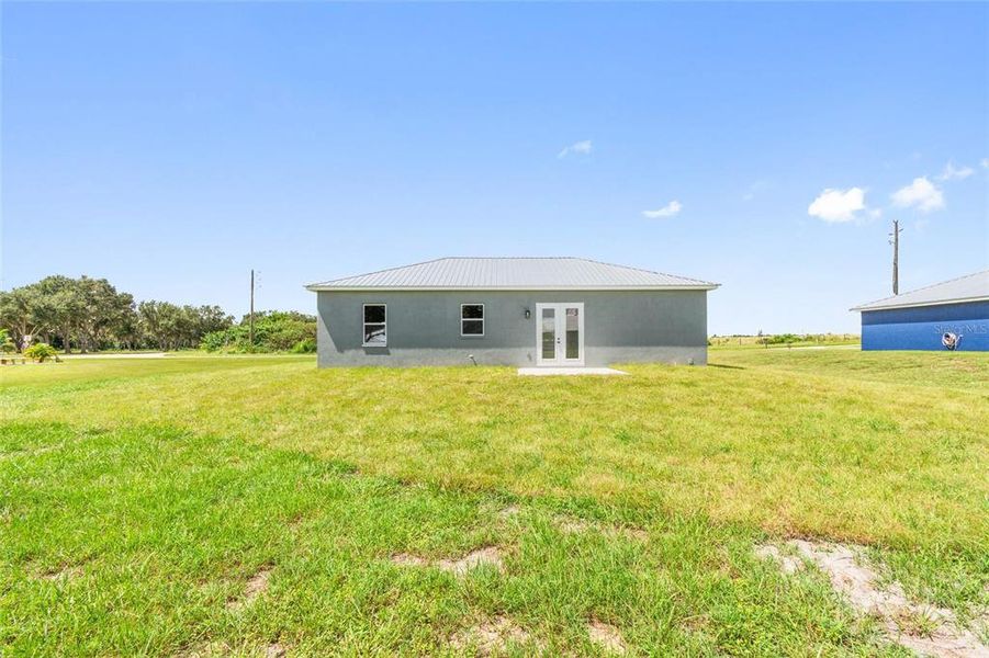 Front exterior of a new home in , Fort Meade, FL, highlighting curb appeal (Image 22).