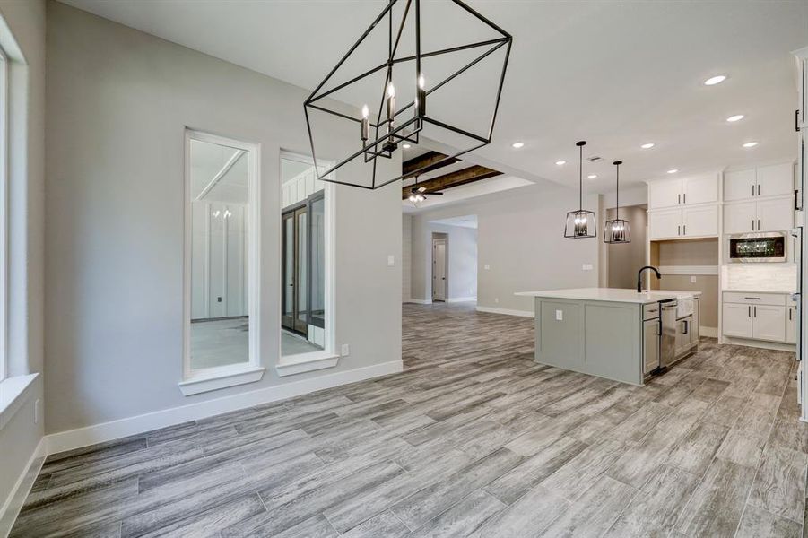 THE PICTURE SHOWN IS NOT THE ACTUAL HOME. TRINITY SIGNATURE HOMES IS BUILDING A SIMILAR FLOOR PLAN.