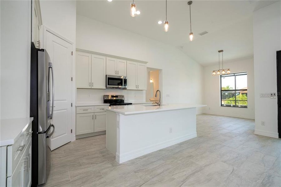 Furnished interior view inside a new home in , Port Charlotte (Image 6). Furnished interior view inside a new home in , Port Charlotte (Image 6).