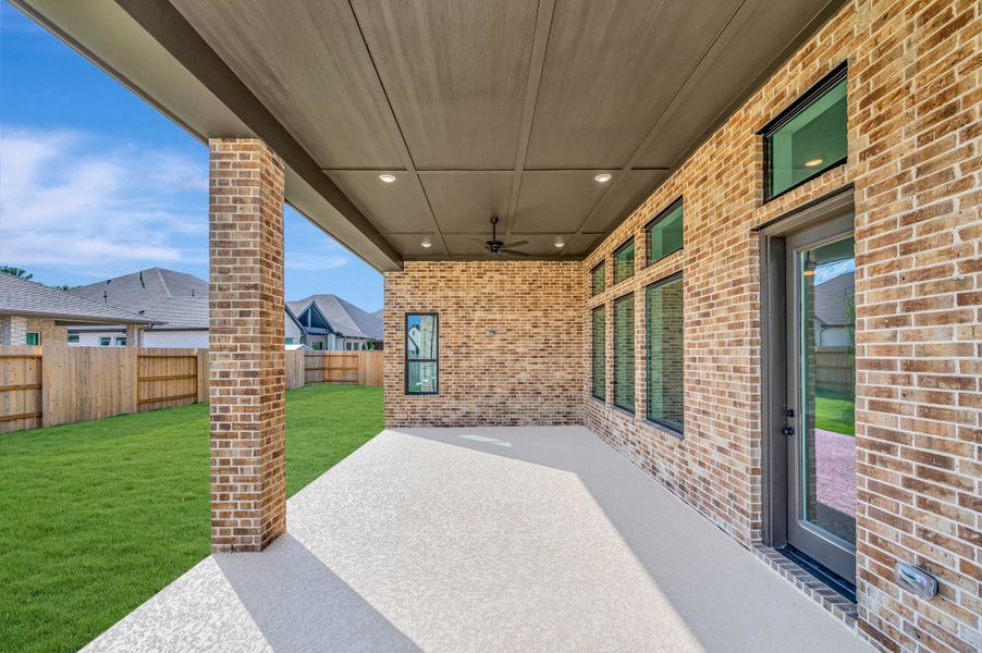 Exterior details and patio area of a home in ARTAVIA - Parkview Collection, Conroe (Image 4).