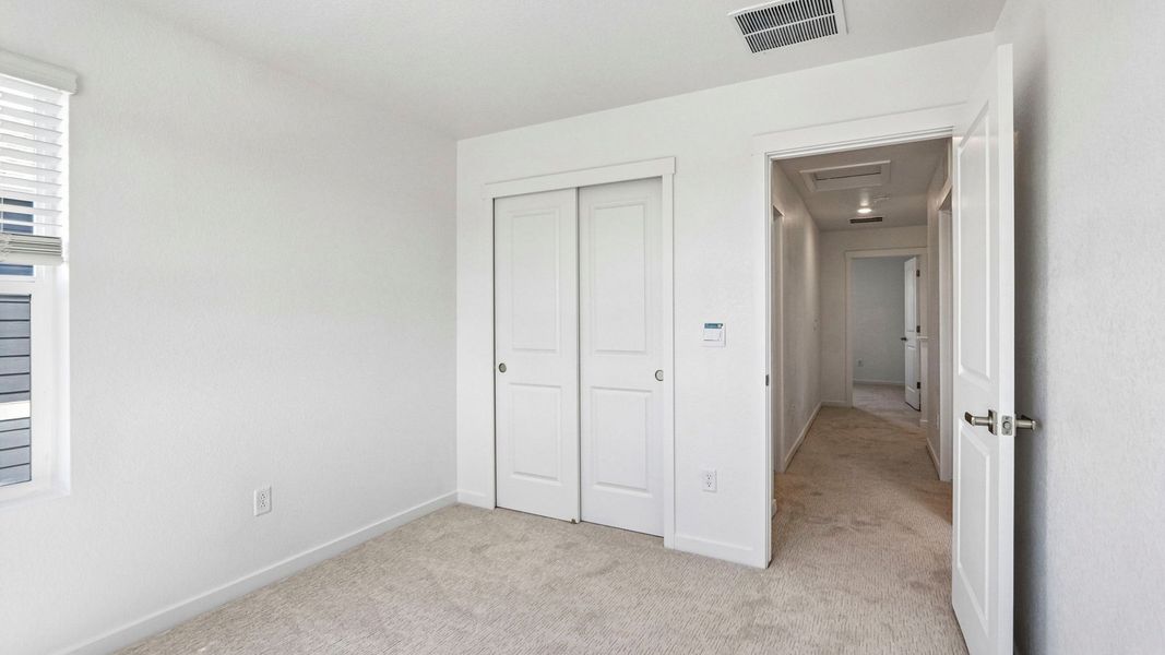 Spacious, unfurnished interior of a new home in Prairie Song, Windsor (Image 22).