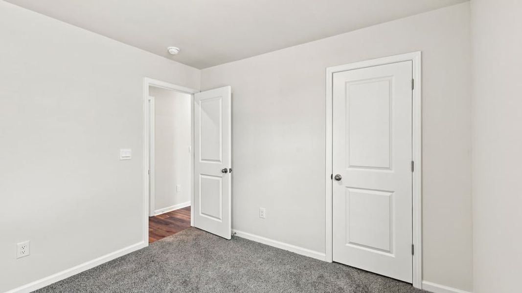 Spacious, unfurnished interior of a new home in Village 3, Woodruff (Image 23). Spacious, unfurnished interior of a new home in Village 3, Woodruff (Image 23).