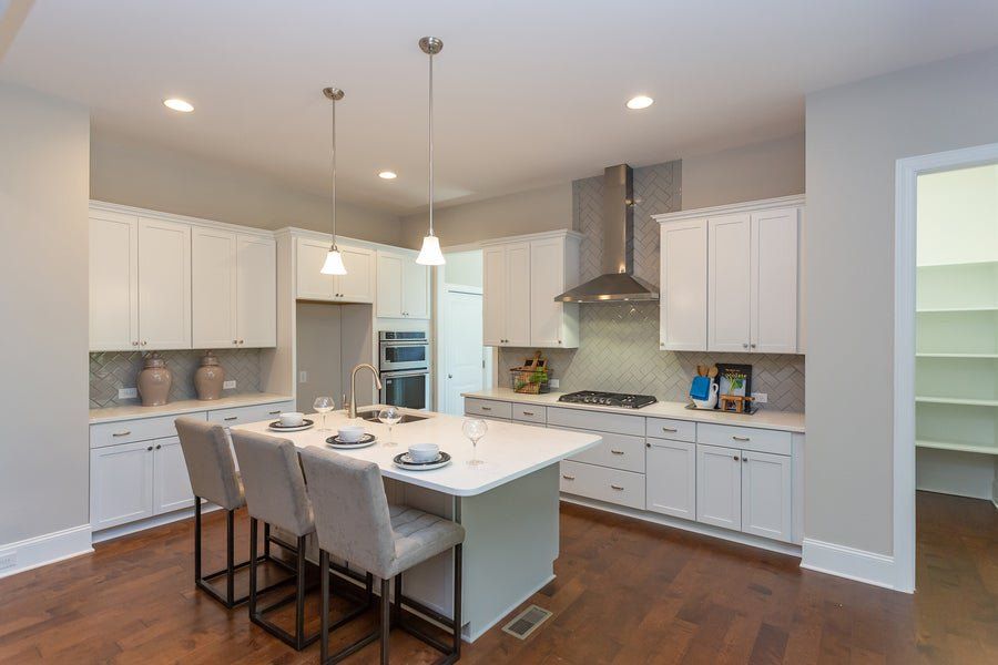 Representative furnished interior of a home built from the Lexington II by Caruso Homes in Sauls Landing, Zebulon (Image 12). Representative furnished interior of a home built from the Lexington II by Caruso Homes in Sauls Landing, Zebulon (Image 12).
