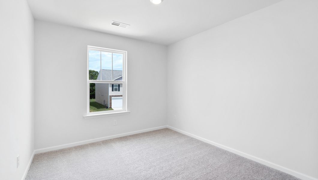 Representative unfurnished interior of a home built from the AISLE by D.R. Horton in Harrier Point, Woodruff (Image 15).