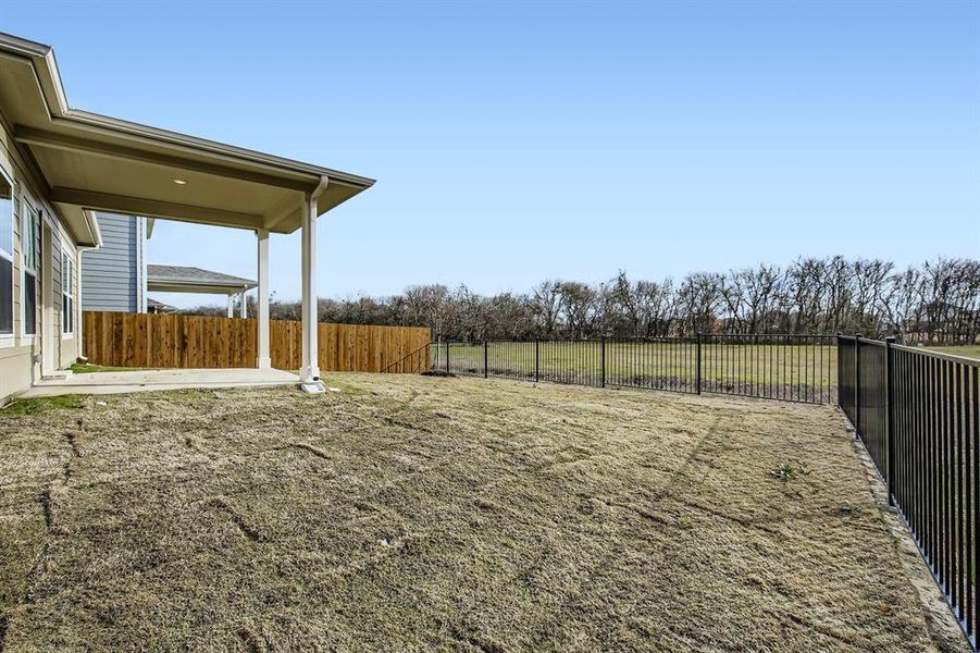 Exterior details and patio area of a home in Ambergrove, Royse City (Image 4).