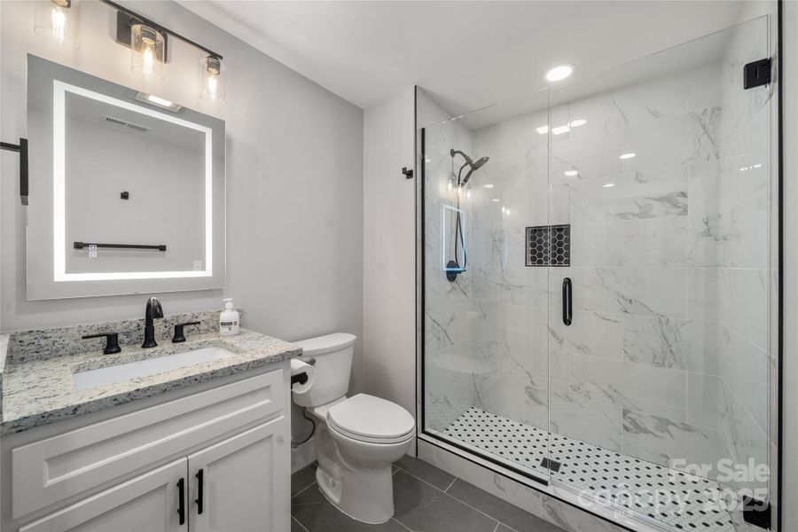 Lower level full bath with smart mirror
