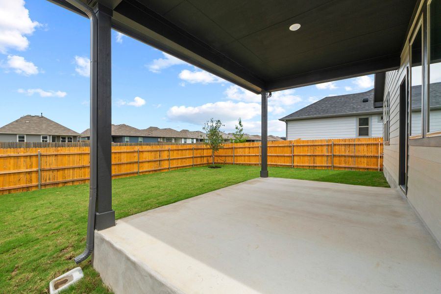 Covered Patio on the Pearl home plan by Trophy Signature Homes – REPRESENTATIVE PHOTO