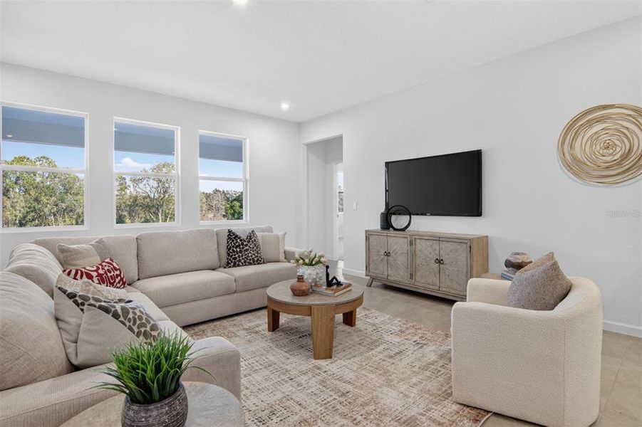 Furnished interior view inside a new home in Rainwood, Clermont (Image 8).