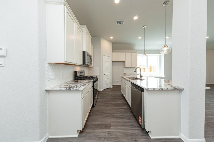 Furnished interior view inside a new home in Bluestem, Brookshire (Image 4). Furnished interior view inside a new home in Bluestem, Brookshire (Image 4).