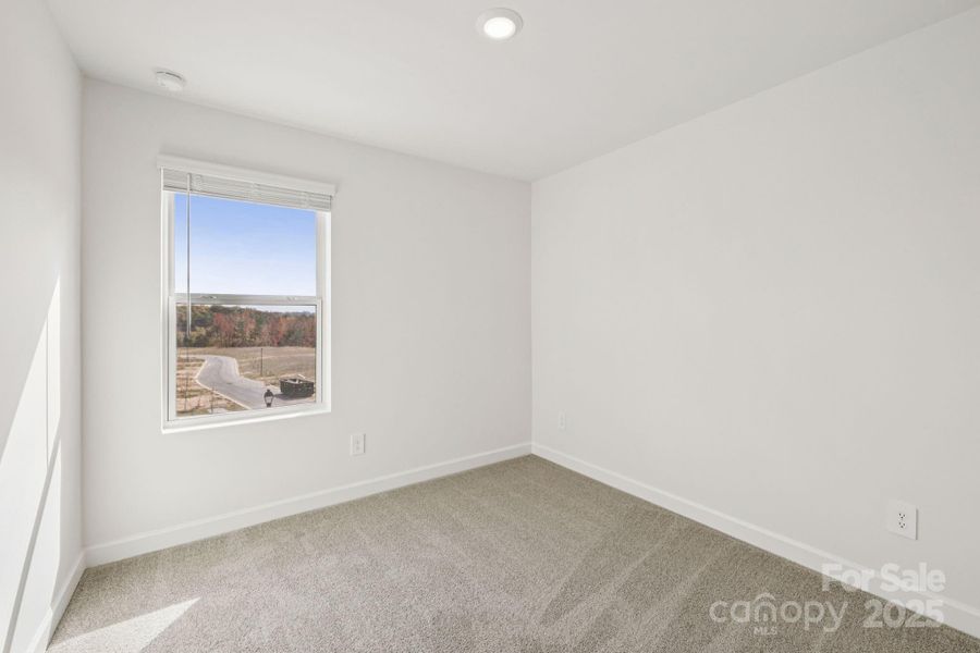 Spacious, unfurnished interior of a new home in Meadows at Wilson Farms - The Heights Series, Fort Mill (Image 28). Spacious, unfurnished interior of a new home in Meadows at Wilson Farms - The Heights Series, Fort Mill (Image 28).