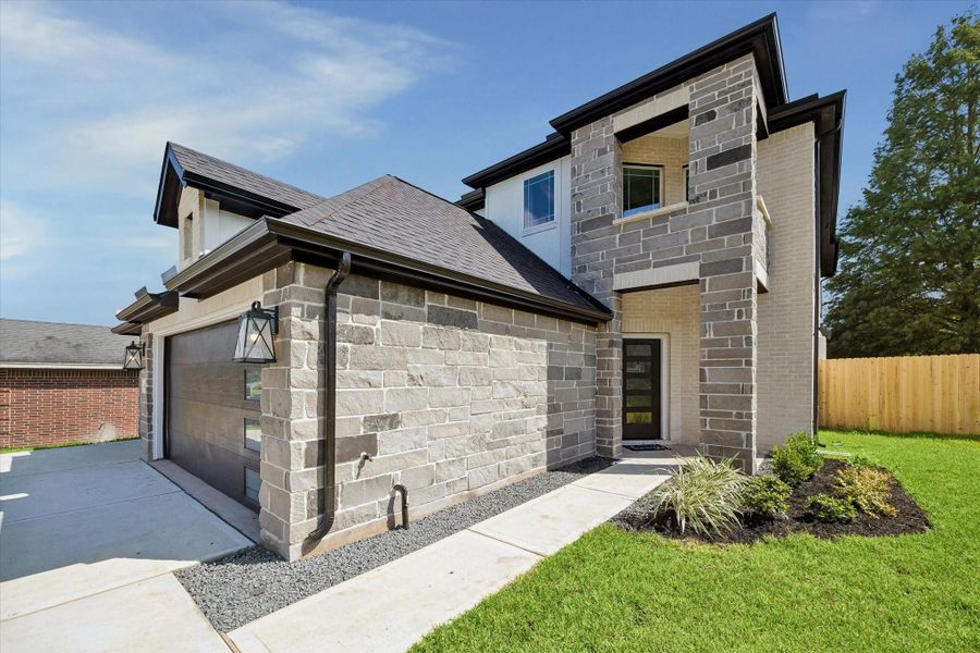 Front exterior of a new home in , Montgomery, TX, highlighting curb appeal (Image 19).