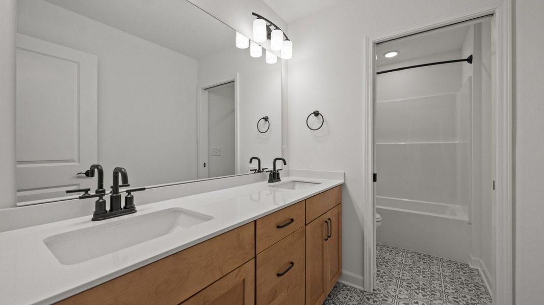 Representative furnished interior of a home built from the Victoria by Epcon Communities in Village at Maple Leaf Farm, King (Image 20).