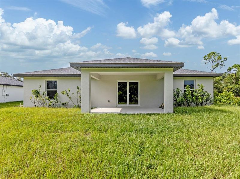 Exterior details and patio area of a home in , Port Charlotte (Image 24).