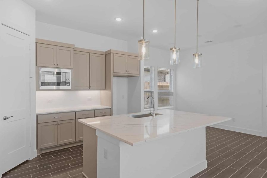 Representative furnished interior of a home built from the St Andrews by Chesmar Homes in Riceland Alley Loads, Mont Belvieu (Image 6).