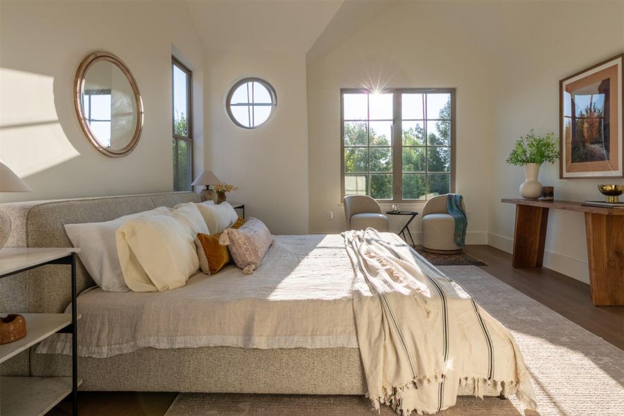 Vaulted ceilings and wood flooring define this peaceful bedroom retreat. Vaulted ceilings and wood flooring define this peaceful bedroom retreat.