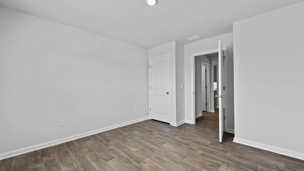 Spacious, unfurnished interior of a new home in Center Pointe, Santee (Image 20).