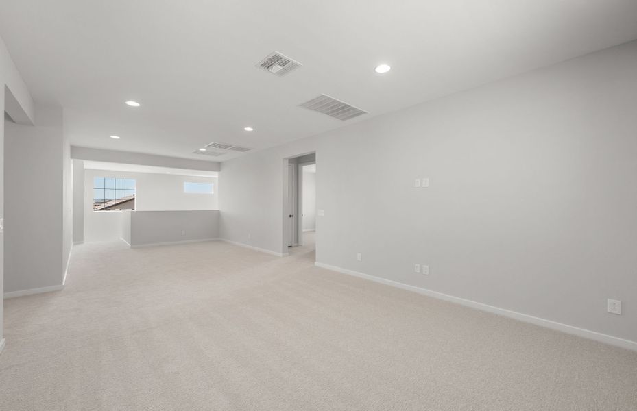 Spacious, unfurnished interior of a new home in Legado West, Queen Creek (Image 29).