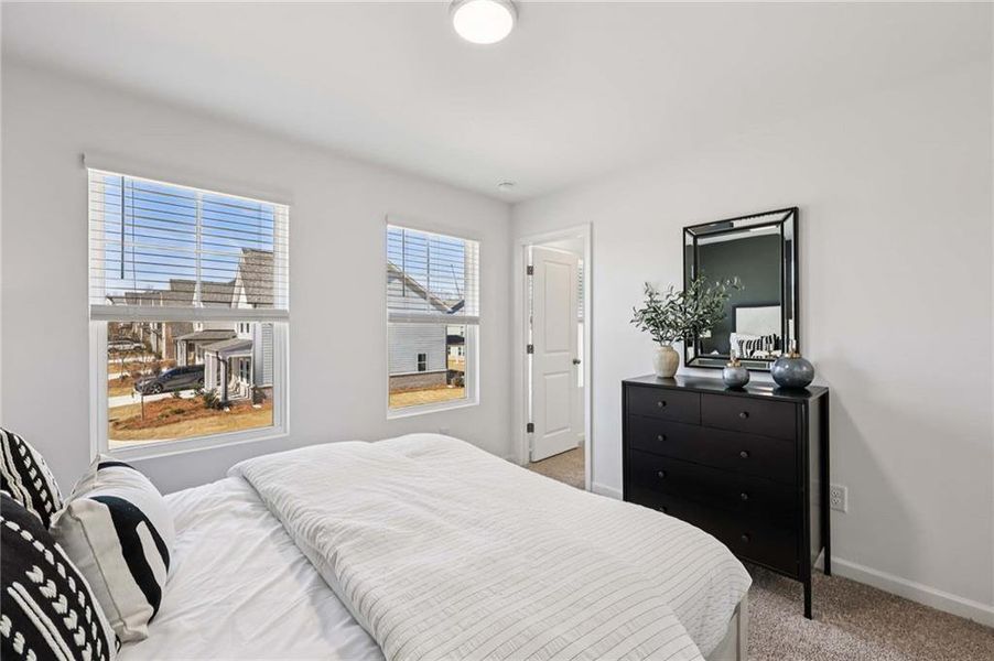 Furnished interior view inside a new home in Eastlyn Crossing, Flowery Branch (Image 17).