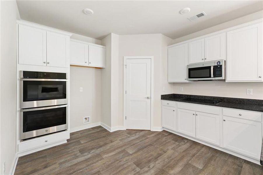 Furnished interior view inside a new home in Fern Dale, Fairburn (Image 6).