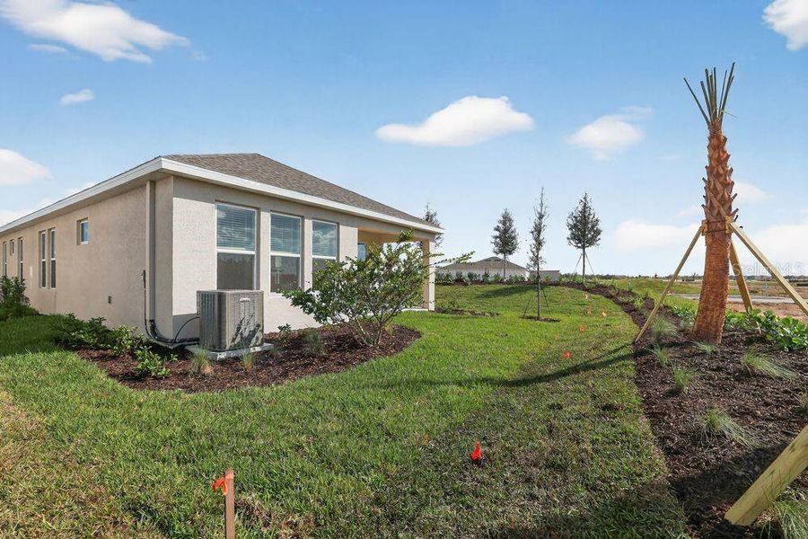 Exterior details and patio area of a home in Firethorn, Parrish (Image 3). Exterior details and patio area of a home in Firethorn, Parrish (Image 3).