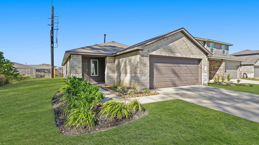 Front exterior of a new home in Breckenridge Forest, Spring, TX, highlighting curb appeal (Image 2). Front exterior of a new home in Breckenridge Forest, Spring, TX, highlighting curb appeal (Image 2).