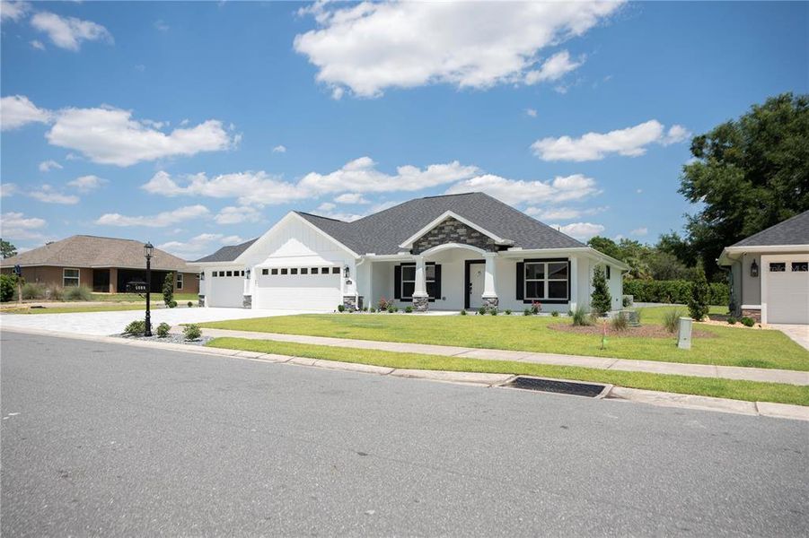 Front exterior of a new home in , Dunnellon, FL, highlighting curb appeal (Image 17).