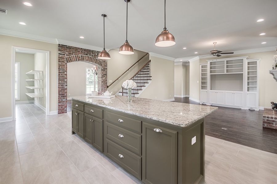 Representative furnished interior of a home built from the The Chateau French by Manuel Builders in Chapel Bend, Montgomery (Image 5).