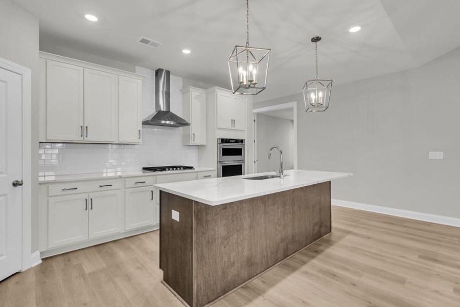 Furnished interior view inside a new home in Tidewater at Lakes of Cane Bay, Summerville (Image 10).