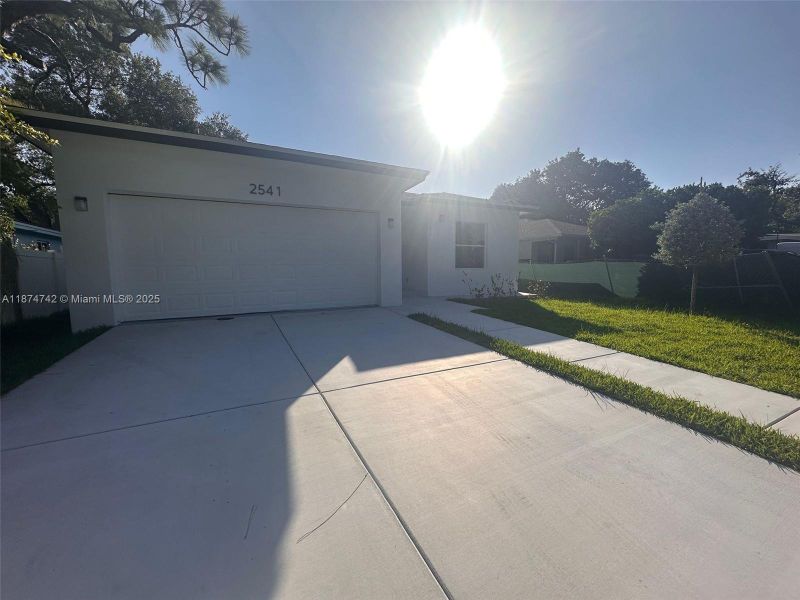 Front exterior of a new home in , Fort Lauderdale, FL, highlighting curb appeal (Image 1). Front exterior of a new home in , Fort Lauderdale, FL, highlighting curb appeal (Image 1).