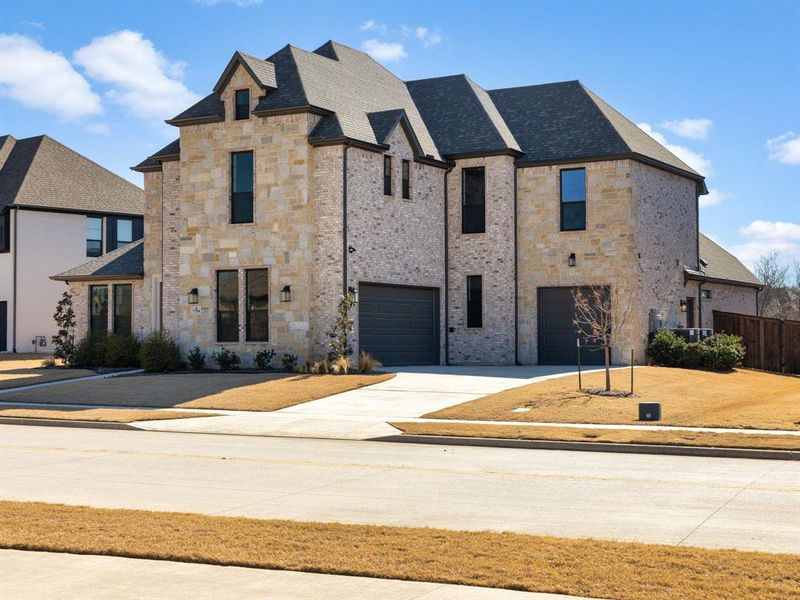 Front exterior of a new home in Canyon Falls, Argyle, TX, highlighting curb appeal (Image 25).