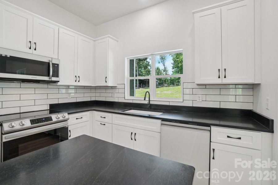 Furnished interior view inside a new home in , Hendersonville (Image 10).