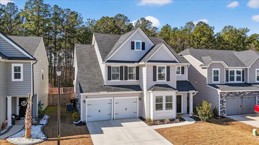 Front exterior of a new home in Cypress Preserve, Moncks Corner, SC, highlighting curb appeal (Image 2). Front exterior of a new home in Cypress Preserve, Moncks Corner, SC, highlighting curb appeal (Image 2).
