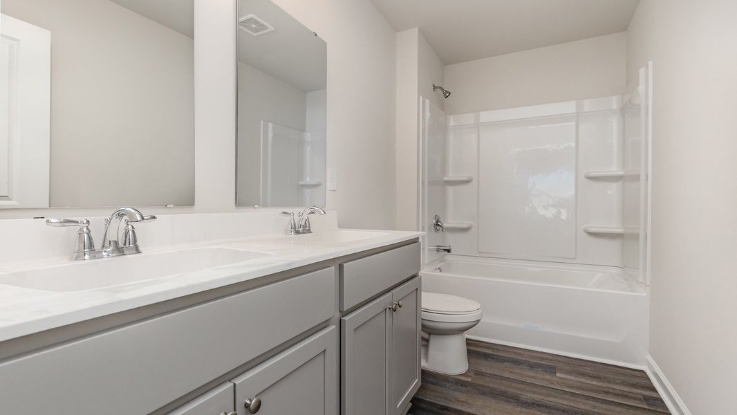 Furnished interior view inside a new home in Sandridge Park, Little River (Image 12).