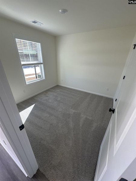Spacious, unfurnished interior of a new home in Piney Woods Bluff, Columbia (Image 9).