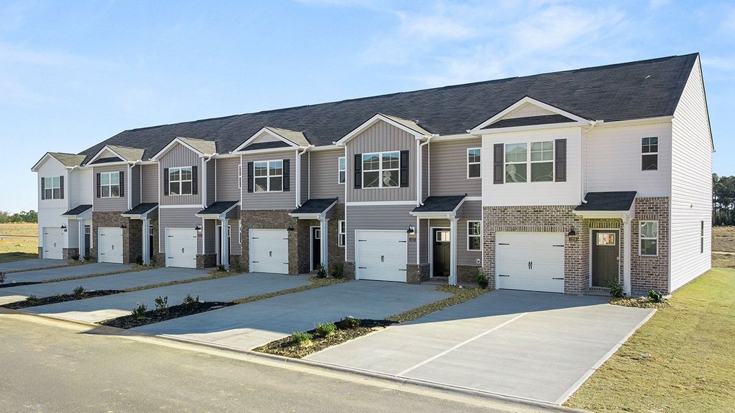 Front exterior of a new home in Weatherstone, Grovetown, GA, highlighting curb appeal (Image 2). Front exterior of a new home in Weatherstone, Grovetown, GA, highlighting curb appeal (Image 2).