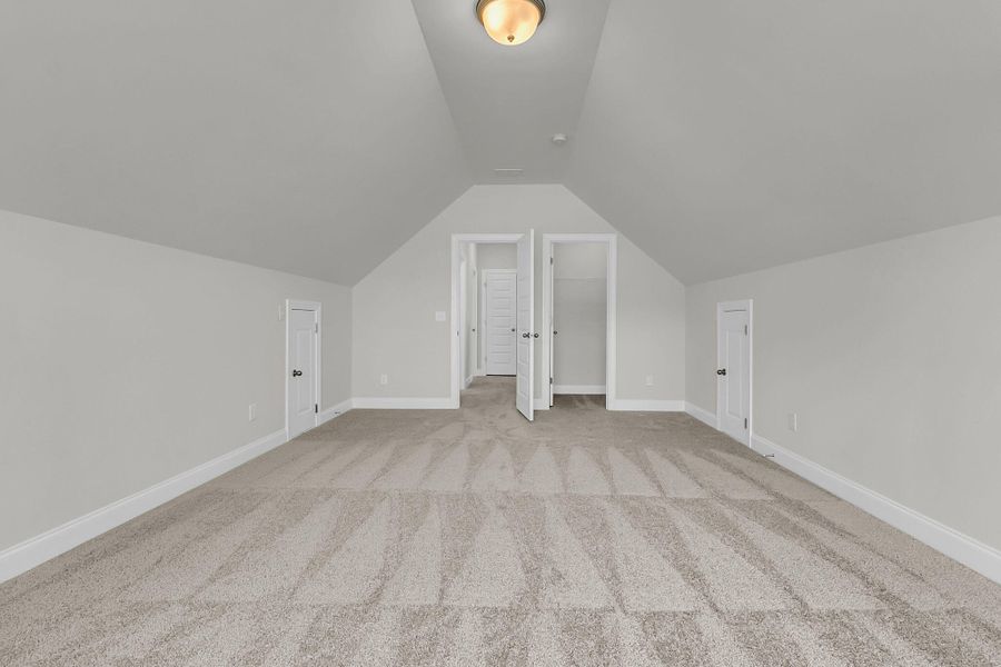 Spacious, unfurnished interior of a new home in Tidewater at Lakes of Cane Bay, Summerville (Image 22). Spacious, unfurnished interior of a new home in Tidewater at Lakes of Cane Bay, Summerville (Image 22).