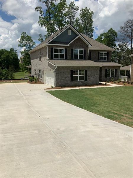 Front exterior of a new home in , Villa Rica, GA, highlighting curb appeal (Image 20). Front exterior of a new home in , Villa Rica, GA, highlighting curb appeal (Image 20).