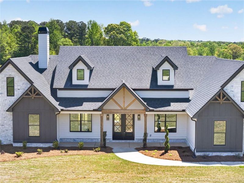 Front exterior of a new home in The Meadows at Lake Circle, Buchanan, GA, highlighting curb appeal (Image 26).
