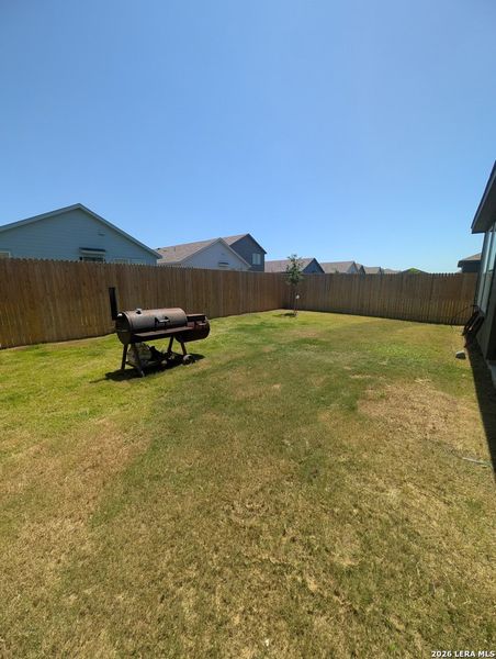 Exterior details and patio area of a home in Rose Valley, Converse (Image 24).