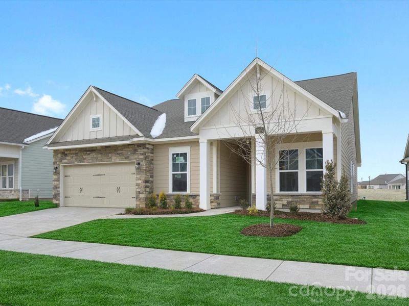 Front exterior of a new home in Encore at Streamside - Tradition Series, Waxhaw, NC, highlighting curb appeal (Image 10).