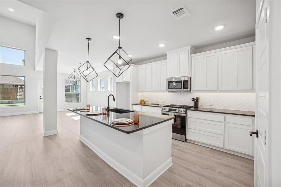 Furnished interior view inside a new home in Creekshaw – Classic, Royse City (Image 13). Furnished interior view inside a new home in Creekshaw – Classic, Royse City (Image 13).
