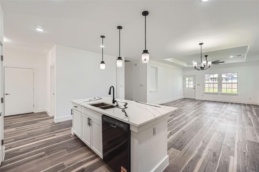 Kitchen featuring black dishwasher, a chandelier, and recessed lighting