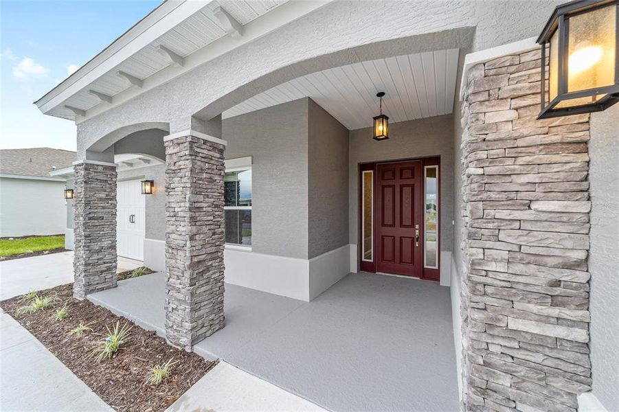 Exterior details and patio area of a home in On Top of the World Communities, Ocala (Image 23).