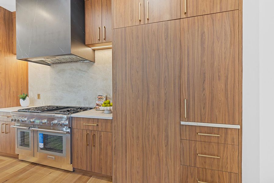 Walnut cabinets offer storage and functionality galore. Butlers pantry closed... Walnut cabinets offer storage and functionality galore. Butlers pantry closed...