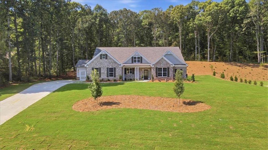 Front exterior of a new home in , Monroe, GA, highlighting curb appeal (Image 32).
