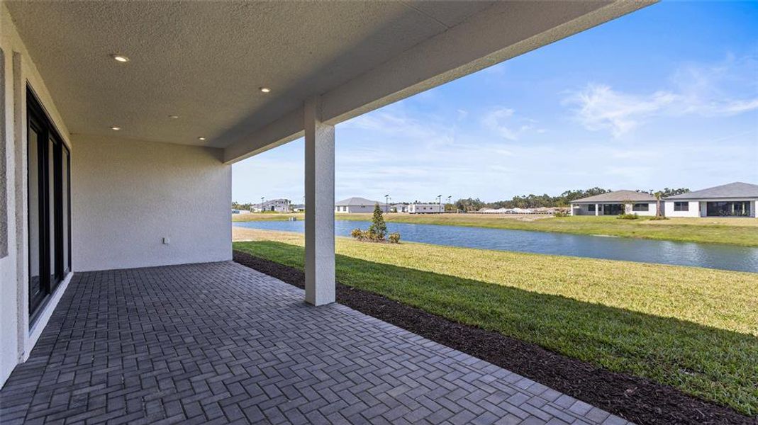 Exterior details and patio area of a home in Woodland Preserve, Parrish (Image 4).